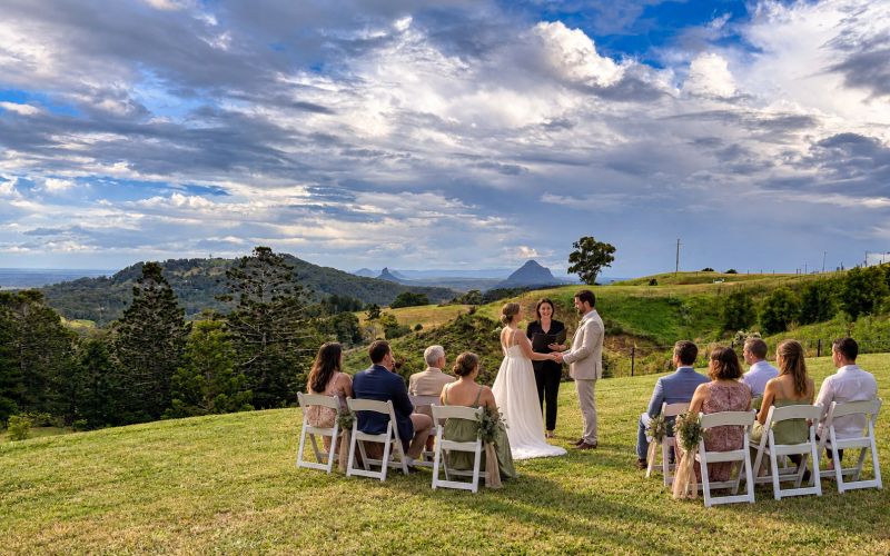 Guests seated for a ceremony on the hillside at On The View